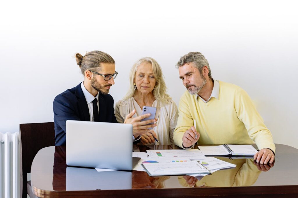 Business owner reviewing insurance paperwork with an agent, highlighting the importance of choosing the right BOE insurance for small business protection.