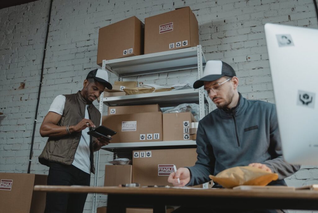 Small business team working in an office, showcasing how Business Overhead Expense insurance keeps operations running during unexpected owner absences.